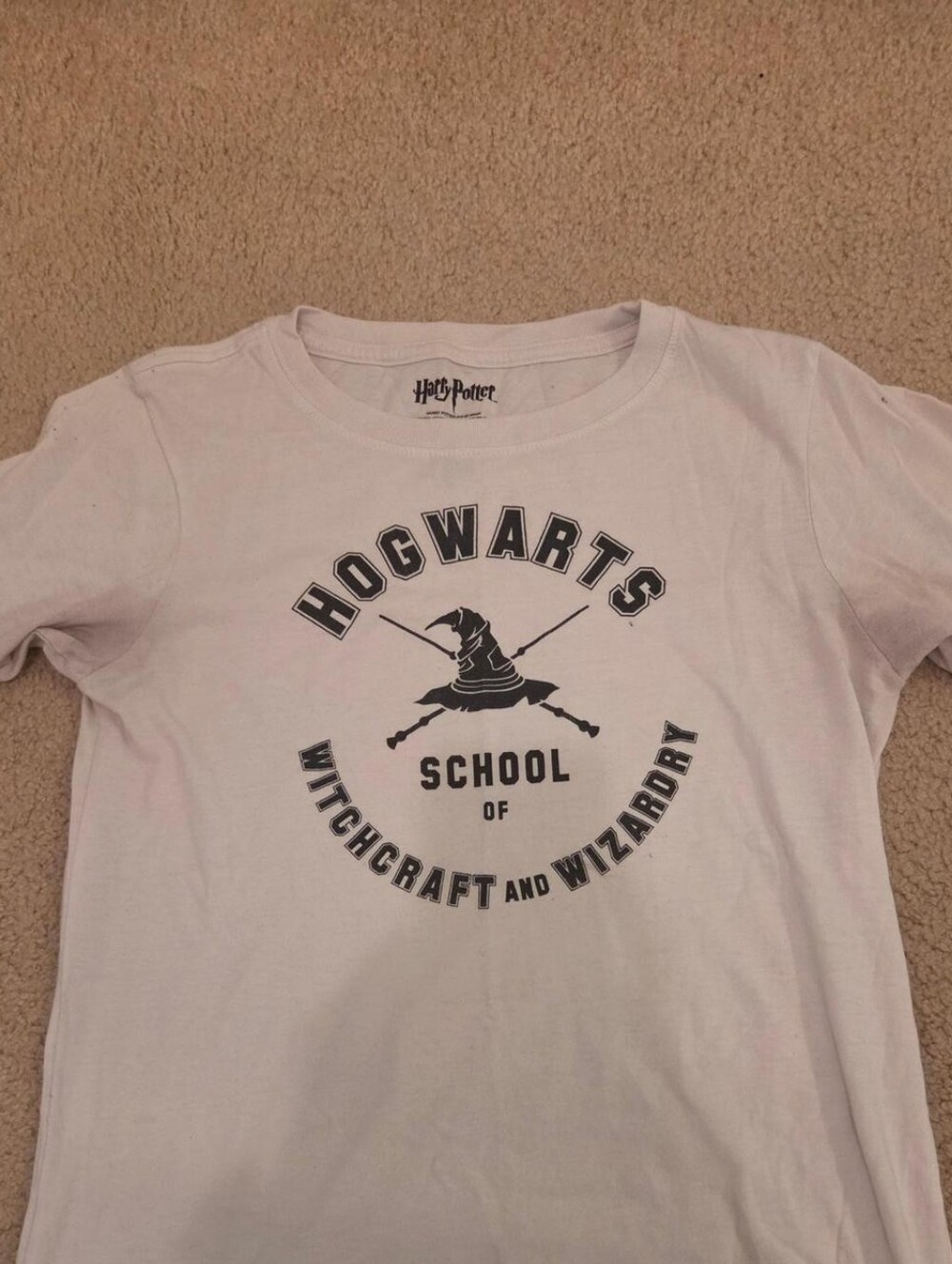 Warner Bros. Hogwarts White Short Sleeve Tee with Black Crest